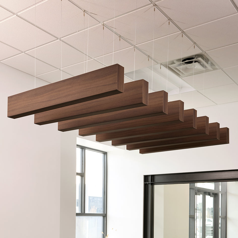 Modern conference room with wooden ceiling feature and large windows.