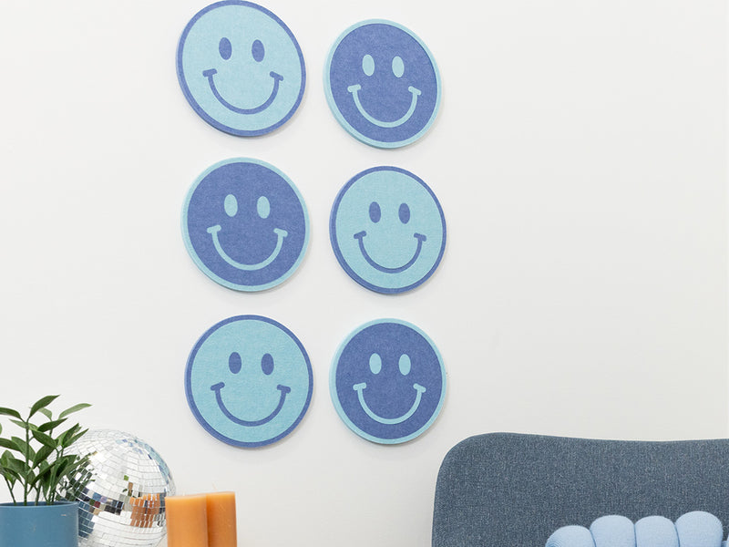 6 Smiley Face Decals on a Wall