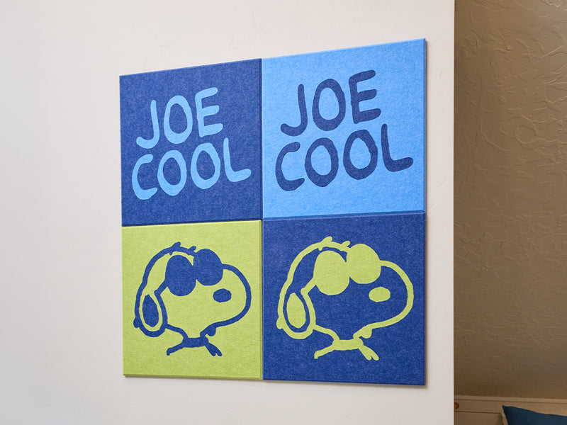 Four-panel wall art with 'Joe Cool' text and Snoopy illustrations on a white wall.