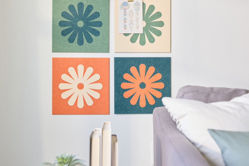 Colorful Flower Tiles Installed on Wall Behind Couch.
