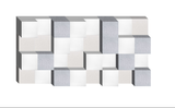 Three-dimensional modular wall design with white, gray, and beige interlocking cubic blocks.
