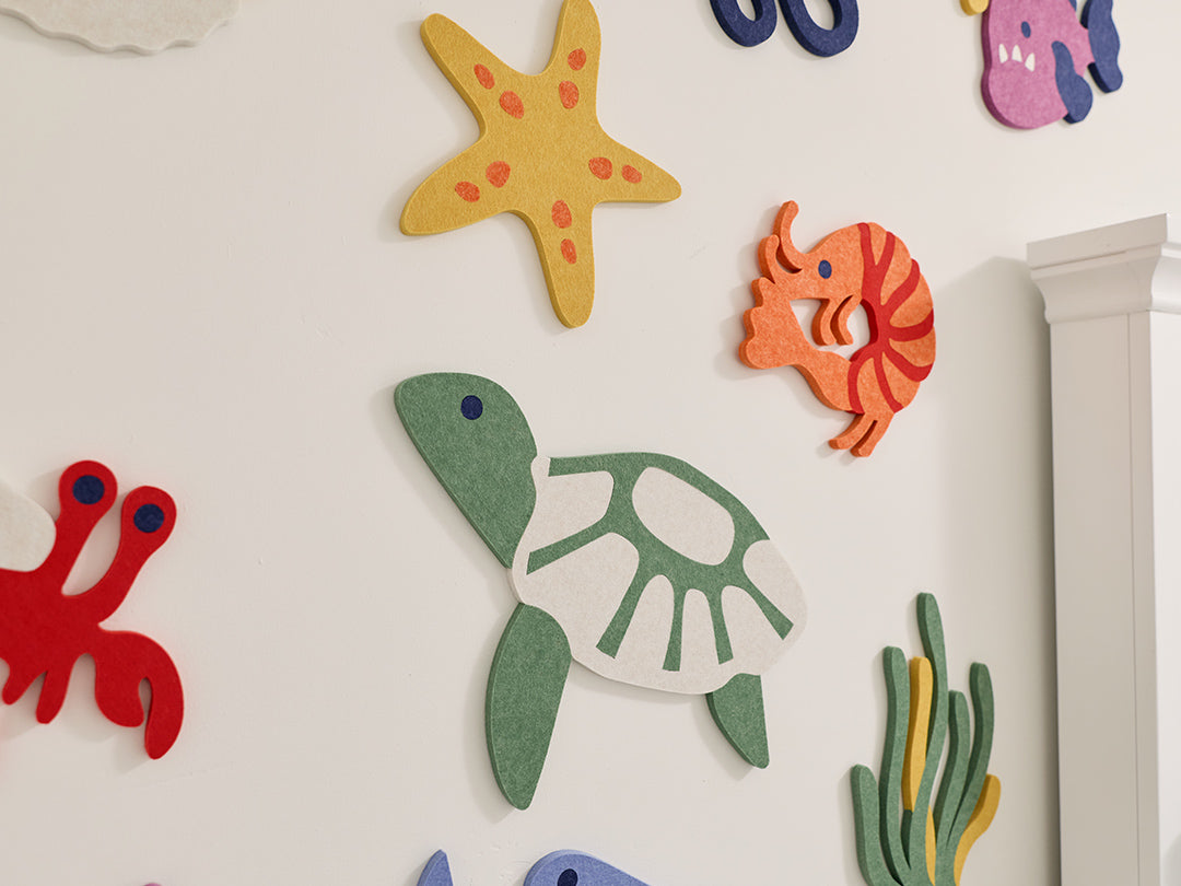 Colorful sea-themed wall Tiles on a white wall
