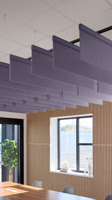 Soft violet acoustic ceiling blade baffles suspended from the ceiling, installed in a conference room. Felt Right's acoustic blade baffles absorb 65% of sound waves, making office spaces quieter and feel more calm.