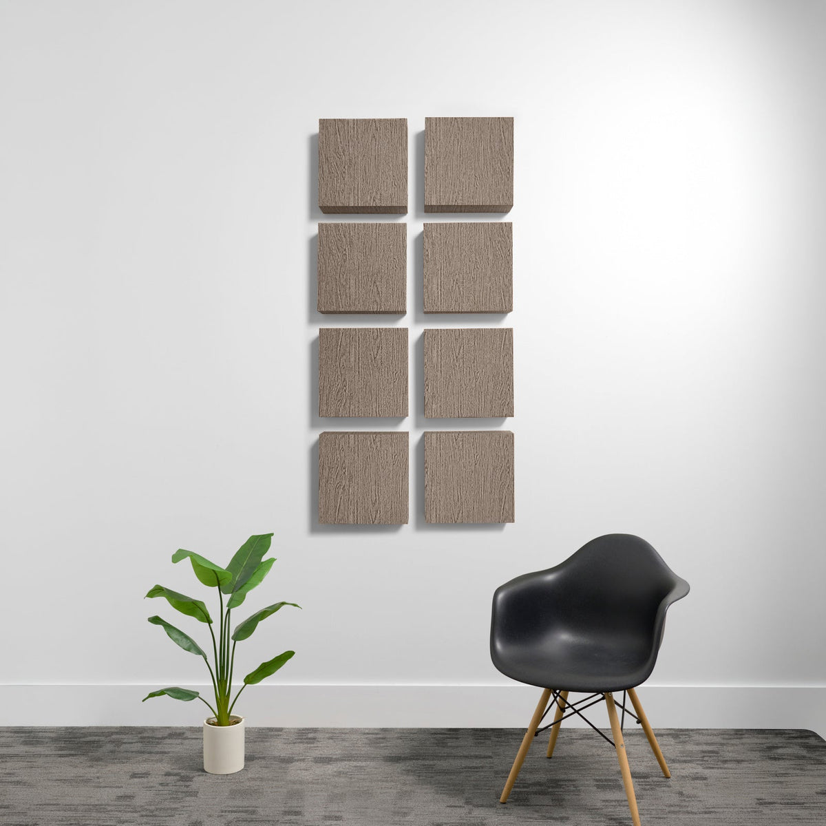 Eight tan woven acoustic panels arranged in a 2x4 grid on a white wall.