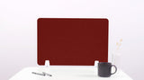 Burgundy desk divider with rounded corners mounted on white base, shown on desk with mug and vase.
