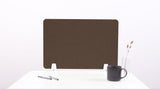 Brown rectangular desk divider with white mounting brackets on white surface next to mug and supplies.
