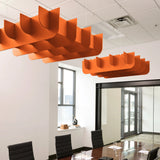Fin 3D Cloud acoustic ceiling baffles in Aries felt above a conference table