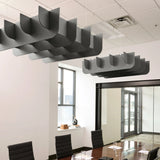 Fin 3D Cloud acoustic ceiling baffles in Armor felt above a conference table