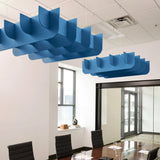 Fin 3D Cloud acoustic ceiling baffles in Cayman felt above a conference table