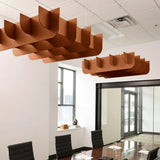Fin 3D Cloud acoustic ceiling baffles in Cinnamon felt above a conference table