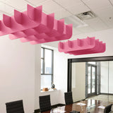 Fin 3D Cloud acoustic ceiling baffles in Hot Pink felt above a conference table
