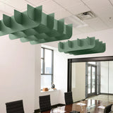 Fin 3D Cloud acoustic ceiling baffles in Mint felt above a conference table