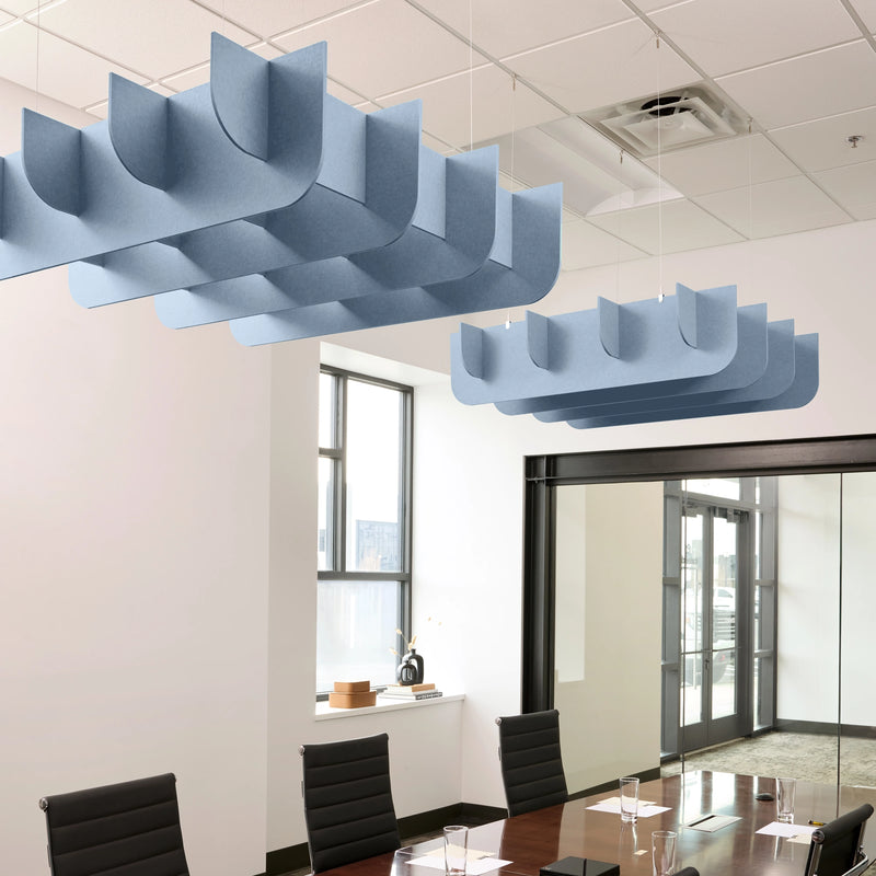 Fin 3D Cloud acoustic ceiling baffles in Powder Blue felt above a conference table