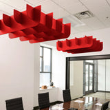 Fin 3D Cloud acoustic ceiling baffles in Scarlet felt above a conference table