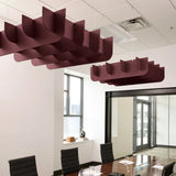 Fin 3D Cloud acoustic ceiling baffles in Wine felt above a conference table