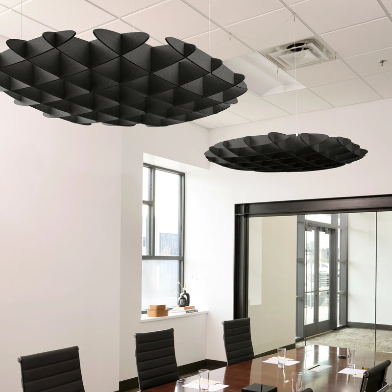 Foil 3D Cloud acoustic ceiling baffles in Cast felt above a conference table