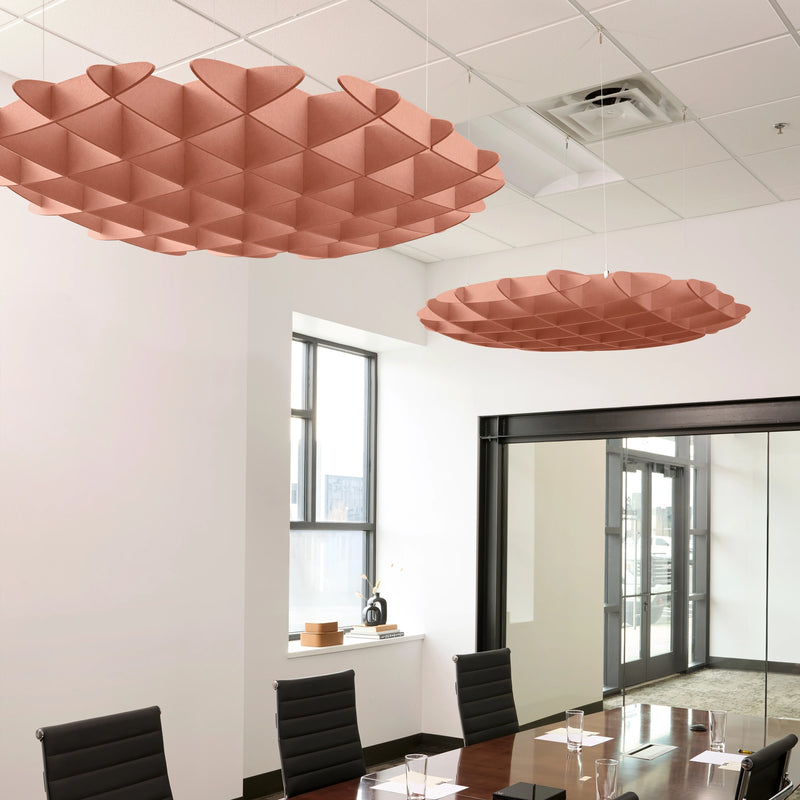 Foil 3D Cloud acoustic ceiling baffles in Coral felt above a conference table