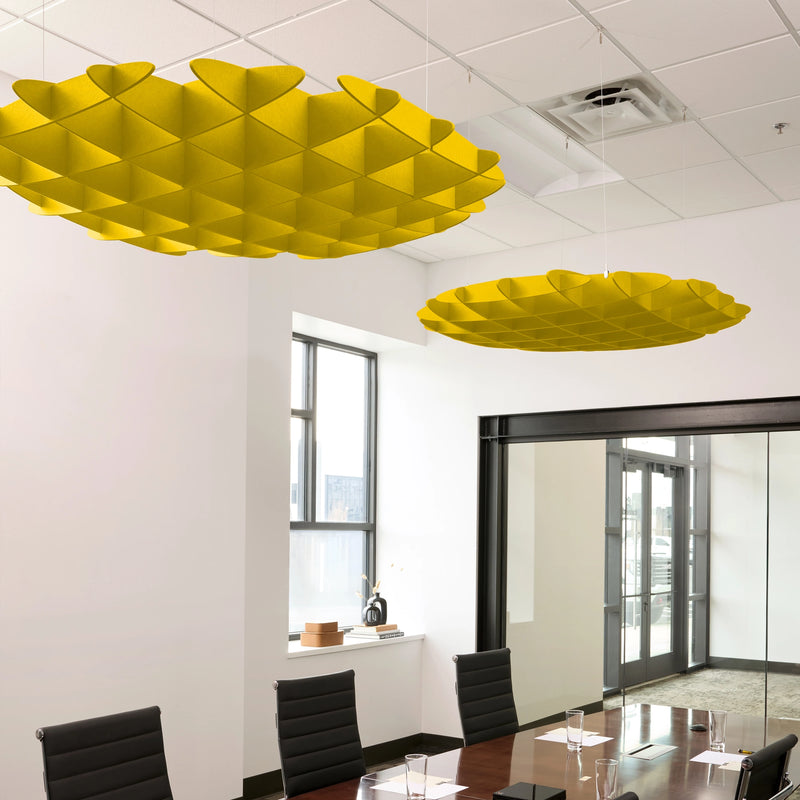 Foil 3D Cloud acoustic ceiling baffles in Dandelion felt above a conference table