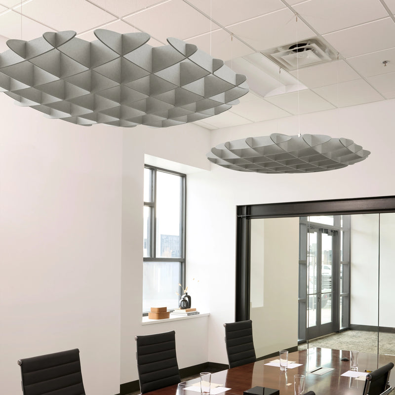 Foil 3D Cloud acoustic ceiling baffles in Fog felt above a conference table