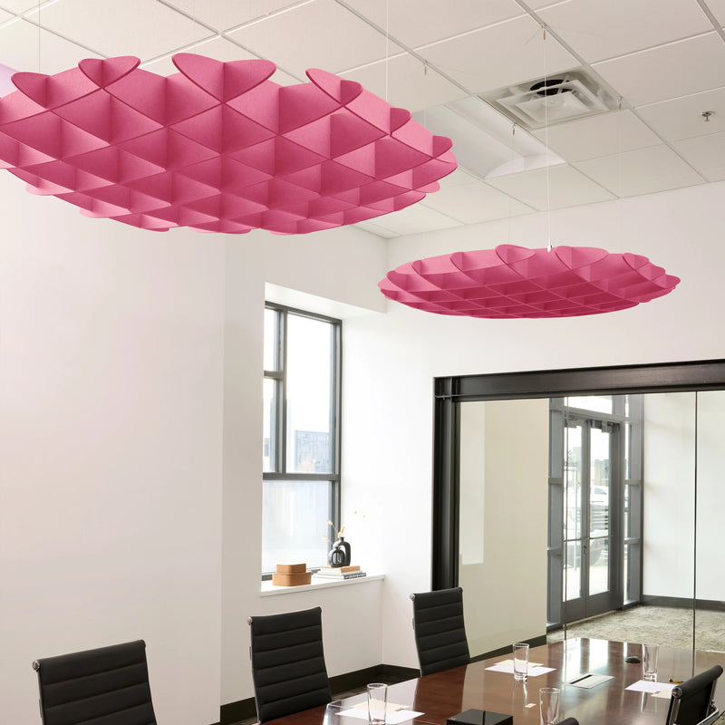 Foil 3D Cloud acoustic ceiling baffles in Hot Pink felt above a conference table