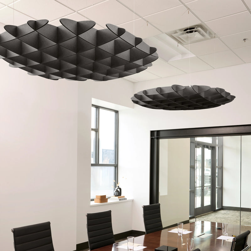 Foil 3D Cloud acoustic ceiling baffles in Mineral felt above a conference table