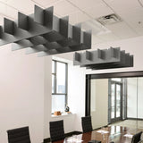 Grid 3D Cloud acoustic ceiling baffles in Armor felt above a conference table