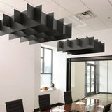 Grid 3D Cloud acoustic ceiling baffles in Cast felt above a conference table