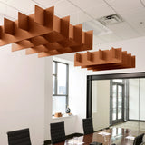 Grid 3D Cloud acoustic ceiling baffles in Cinnamon felt above a conference table