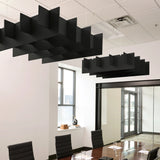Grid 3D Cloud acoustic ceiling baffles in Ebony felt above a conference table