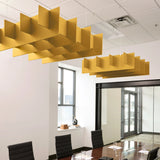Grid 3D Cloud acoustic ceiling baffles in Mustard felt above a conference table