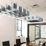 Grid 3D Cloud acoustic ceiling baffles in Nickel felt above a conference table