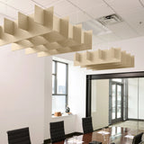 Grid 3D Cloud acoustic ceiling baffles in Porcelain felt above a conference table