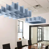 Grid 3D Cloud acoustic ceiling baffles in Powder Blue felt above a conference table