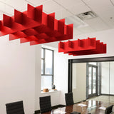 Grid 3D Cloud acoustic ceiling baffles in Scarlet felt above a conference table
