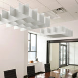 Grid 3D Cloud acoustic ceiling baffles in Zinc felt above a conference table