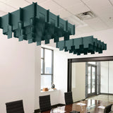 Drop 3D Cloud acoustic ceiling baffles in Atlantic felt above a conference table