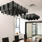 Drop 3D Cloud acoustic ceiling baffles in Cast felt above a conference table