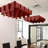 Drop 3D Cloud acoustic ceiling baffles in Crimson felt above a conference table