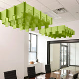 Drop 3D Cloud acoustic ceiling baffles in Kiwi felt above a conference table