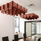 Drop 3D Cloud acoustic ceiling baffles in Moab felt above a conference table