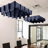 Drop 3D Cloud acoustic ceiling baffles in Oxford felt above a conference table