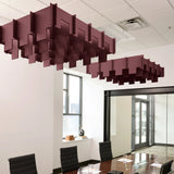 Drop 3D Cloud acoustic ceiling baffles in Wine felt above a conference table