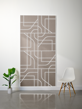 Tan felt sheet with white engraved subway map pattern of intersecting lines and rectangular sections.