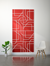 Red felt sheet with white engraved subway map lines and geometric patterns on layered surfaces.