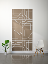 Tan felt sheet with white engraved subway-style geometric lines and rectangular sections forming an abstract map pattern.