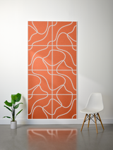 Layered felt sheet with white topographic line pattern on orange background, divided into rectangular sections.