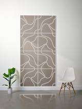 Taupe felt sheet with white engraved topographic lines forming a gridded abstract map pattern.