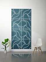 Teal felt sheet with white engraved topographic line pattern in grid sections.