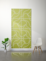 Chartreuse felt sheet with white engraved topographic line pattern and visible layered sections.