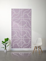 Lavender felt sheet with white engraved topographic line pattern divided into rectangular sections.